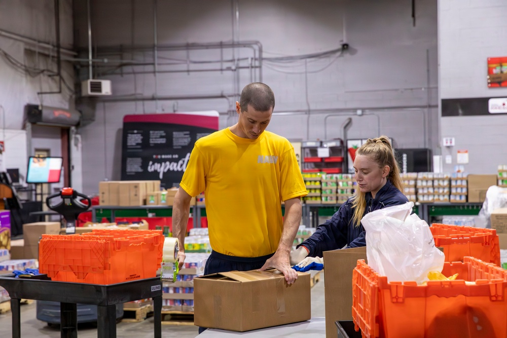 Sailors volunteer at Central Pennsylvania Food Bank during Harrisburg Navy Week