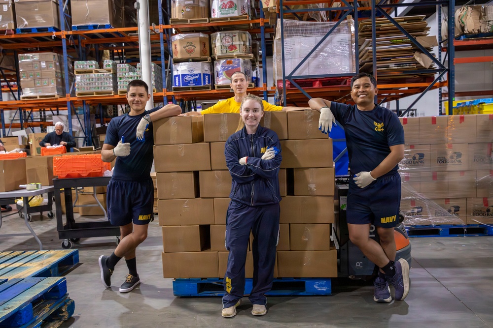 Sailors volunteer at Central Pennsylvania Food Bank during Harrisburg Navy Week
