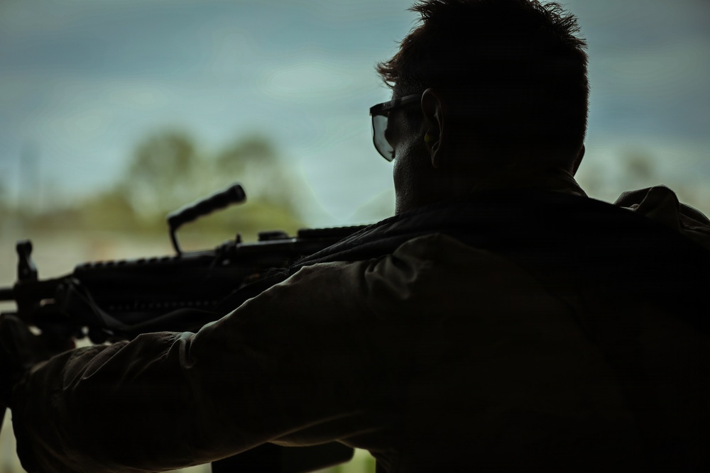 U.S. Army Reserve Soldier Provides Enemy Fire for the Competitors during the Best Squad Competition