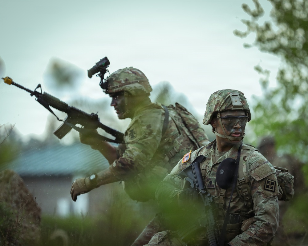 U.S. Army Reserve Soldiers React to Enemy Fire during the Best Squad Competition