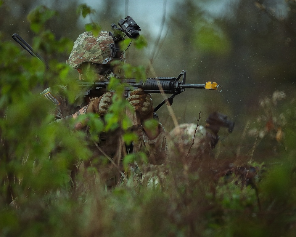 U.S. Army Reserve Soldier Reacts to Contact During the Best Squad Competition