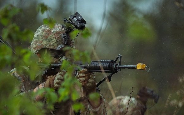U.S. Army Reserve Soldier Reacts to Contact During the Best Squad Competition
