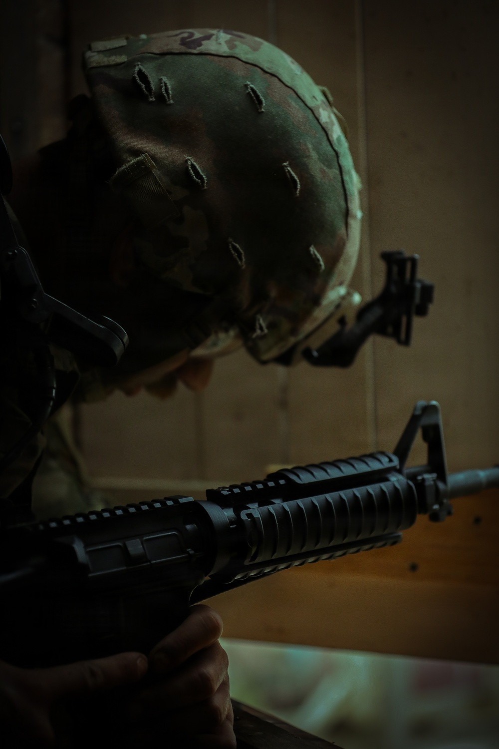 U.S. Army Reserve Soldier Provides Security after Seizing an Enemy Building during the Best Squad Competition