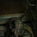 U.S. Army Reserve Soldier Enters a Seized Enemy Building during the Best Squad Competition