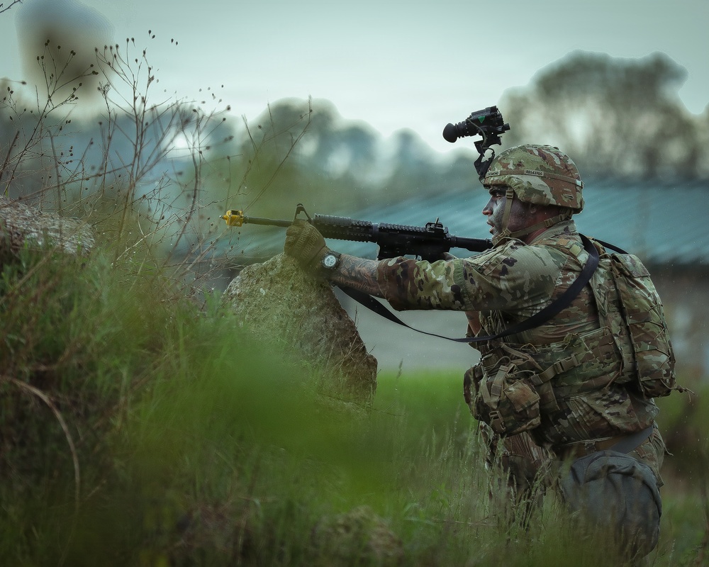 U.S. Army Soldier Reacts to Enemy Contact during the Best Squad Competition