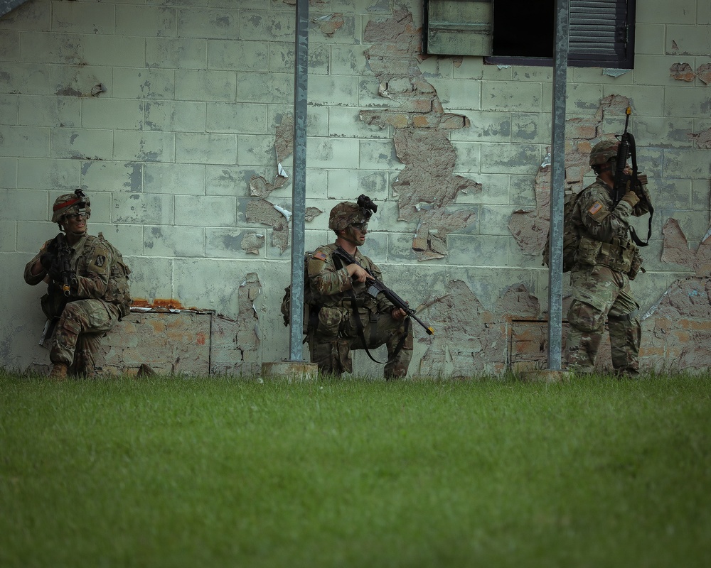 U.S. Army Reserve Soldiers React to a Drone Attack during the Best Squad Competition