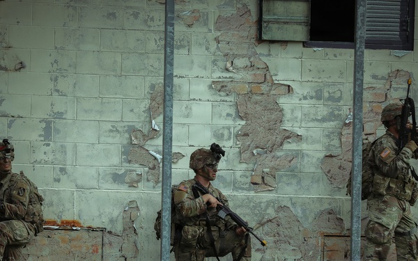 U.S. Army Reserve Soldiers React to a Drone Attack during the Best Squad Competition