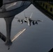 KC-135 refuels F-18