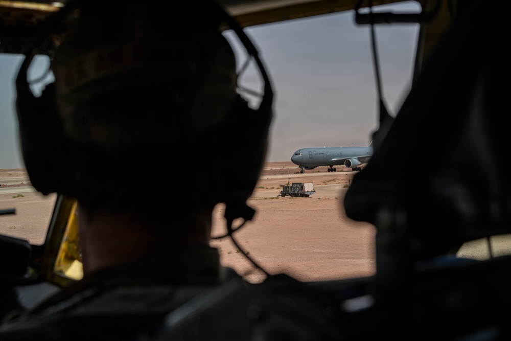 KC-135 Stratotanker refuels F-16 Fighting Falcon during security operations