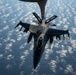 KC-135 Stratotanker refuels F-16 Fighting Falcon during security operations