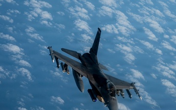 KC-135 Stratotanker refuels F-16 Fighting Falcon during security operations