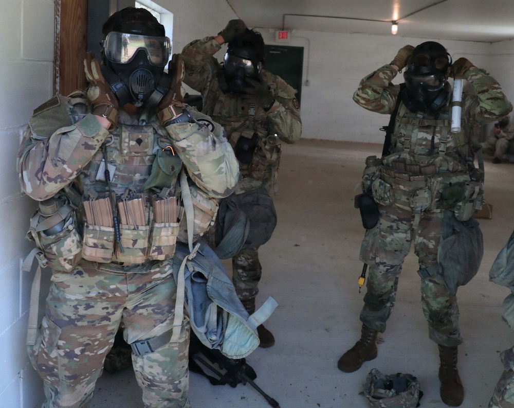 2026 U.S. Army Reserve Best Squad competitors, representing the 9th Mission Support Command, don their gas mask