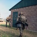 2026 U.S. Army Reserve Best Squad Competition competitors, from the 3rd Theater Medical Command (TMC) prepare to inspect a simulated hostile room