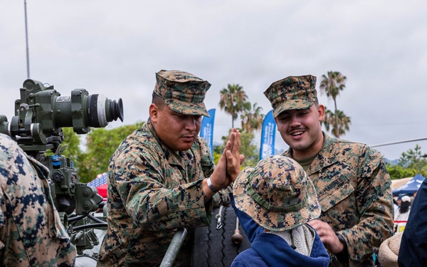 U.S. Service Members and visitors at the Los Angeles Fleet Week Expo