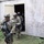 Army Reserve Best Squad competitors, from the 83rd Readiness Training Center, simulate assaulting a hostile village Army Reserve Best Squad competitors, from the 83rd Readiness Training Center, simulate assaulting a hostile village