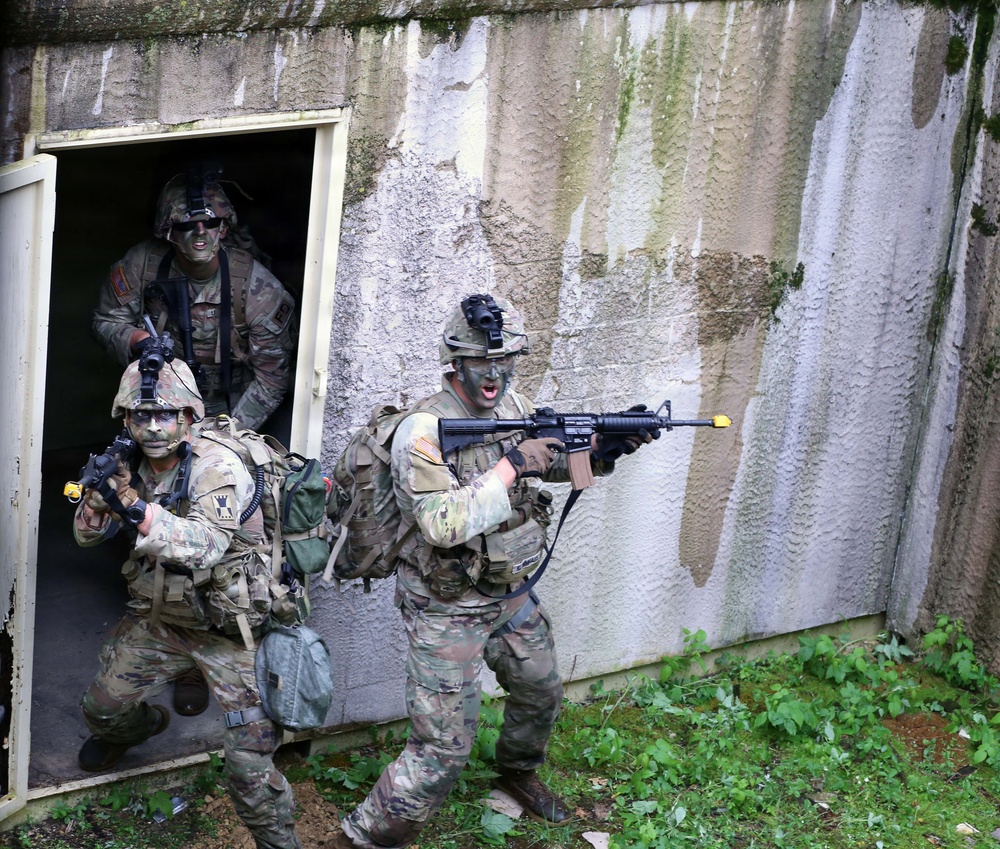 2026 U.S. Army Reserve Best Squad Competition from the 416th Theater Engineer Command, simulate assaulting a hostile village