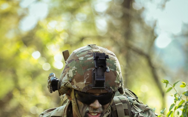 U.S. Army Sodier Provides Security for his Squad during the Best Squad Competition