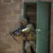 U.S. Army Soldier Leads the Way through a CBRN training during the Best Squad Competition