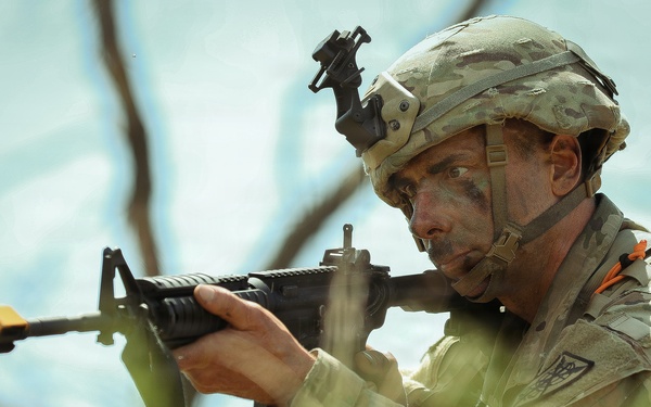 U.S. Army Soldier Reacts to Enemy Contact during the Best Squad Competition