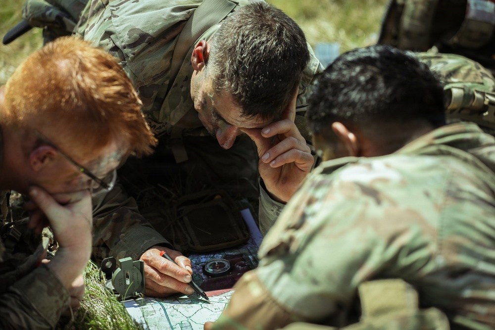 U.S. Army Soldiers Prepare to Navigate Terrain during the Best Squad Competition
