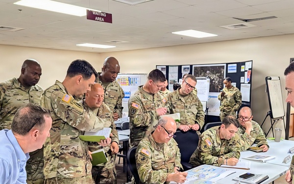 Retired U.S. Army Maj. Gen. Kurt Ryan works with the Senior Leadership of the 184th ESC during Annual Training