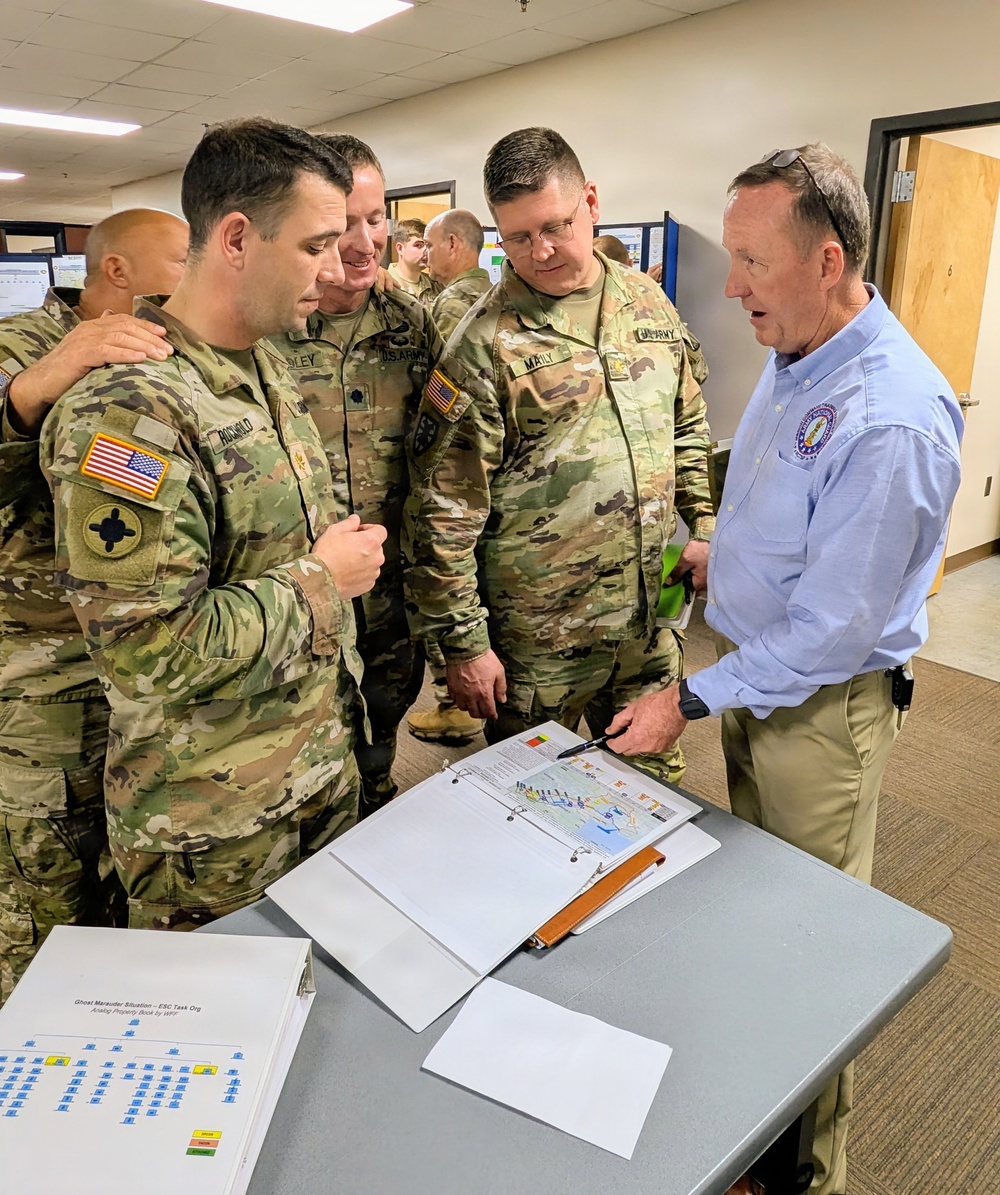 Retired U.S. Army Maj. Gen. Kurt Ryan works with the Senior Leadership of the 184th ESC during Annual Training