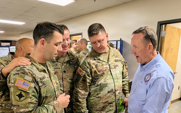 Retired U.S. Army Maj. Gen. Kurt Ryan works with the Senior Leadership of the 184th ESC during Annual Training