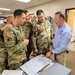 Retired U.S. Army Maj. Gen. Kurt Ryan works with the Senior Leadership of the 184th ESC during Annual Training