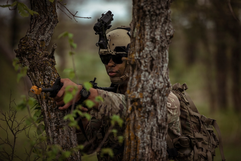 U.S. Army Reserve Soldier Reacts to Enemy Contact during the Best Squad Competition