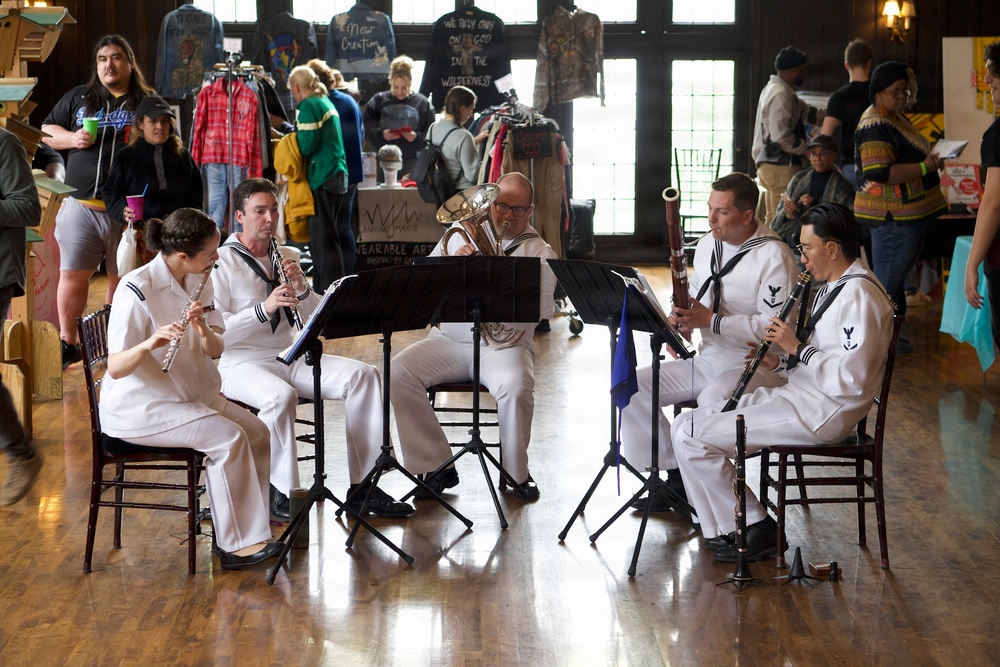 Navy Band Northeast’s Crosswinds Woodwind Quintet enjoyed performing for members of the community at the West Shore Farmers Market during Harrisburg Navy Week and sharing a variety of classical and patriotic selections.