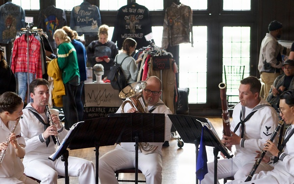 Navy Band Northeast’s Crosswinds Woodwind Quintet enjoyed performing for members of the community at the West Shore Farmers Market during Harrisburg Navy Week and sharing a variety of classical and patriotic selections.