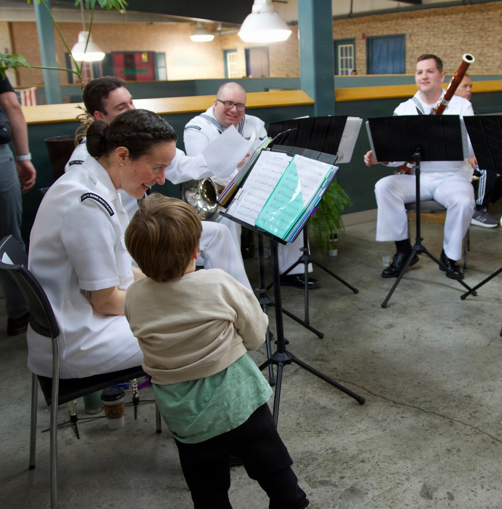 Navy Band Northeast’s Crosswinds Woodwind Quintet enjoyed performing for members of the community at the West Shore Farmers Market during Harrisburg Navy Week and sharing a variety of classical and patriotic selections.