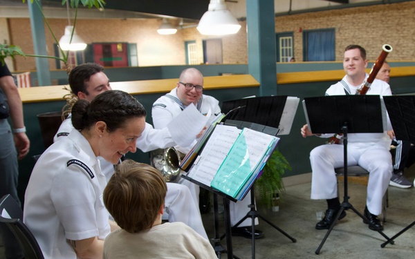 Navy Band Northeast’s Crosswinds Woodwind Quintet enjoyed performing for members of the community at the West Shore Farmers Market during Harrisburg Navy Week and sharing a variety of classical and patriotic selections.