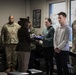 Honor Guard Presents Folded Flag to Adopter of Retired MWD Perle X429