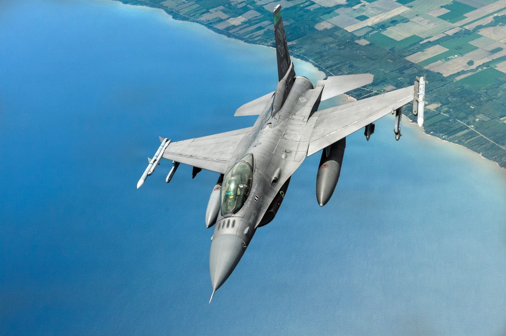 KC-135 refuels F-16