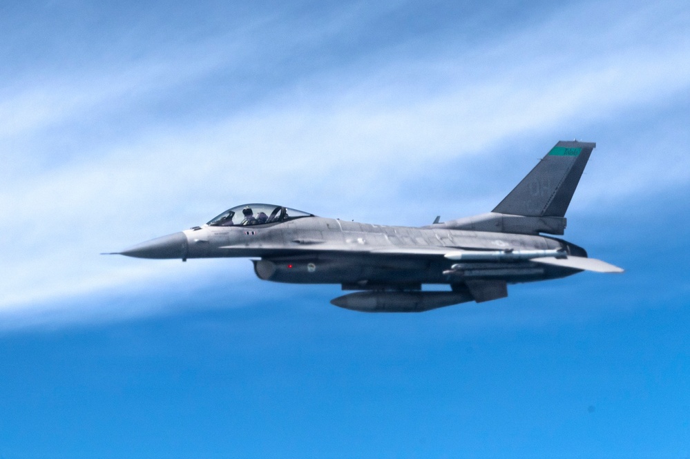 KC-135 refuels F-16