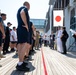 Sailors from USS Howard (DDG 83) participate in a tug-of-war competition during the 87th annual Black Ship Festival in Shimoda, Japan