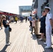 Sailors from USS Howard (DDG 83) participate in a tug-of-war competition during the 87th annual Black Ship Festival in Shimoda, Japan