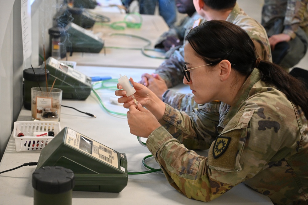 Soldier Validates Mask Fit Test During CBRN Course at JB MDL