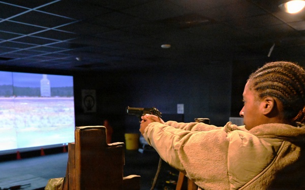 VIARNG 786th MP Company Soldier Aims at JB MDL Simulator