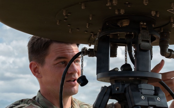 Balikatan 2026: U.S. Airmen maintain receiver transmitter during BK26