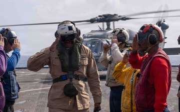 Capt. Timothy Carter, Commander Amphibious Squadron Eleven Visits USS Rushmore