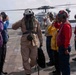 Capt. Timothy Carter, Commander Amphibious Squadron Eleven Visits USS Rushmore