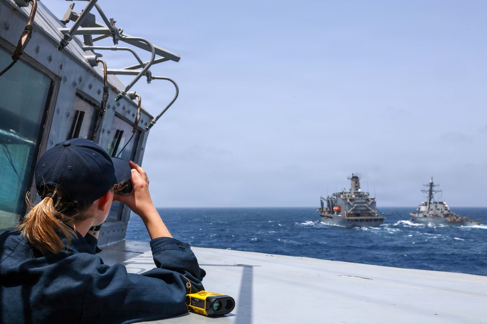 USS John Finn Conducts a Replenishment-at-Sea With USNS Henry J. Kaiser