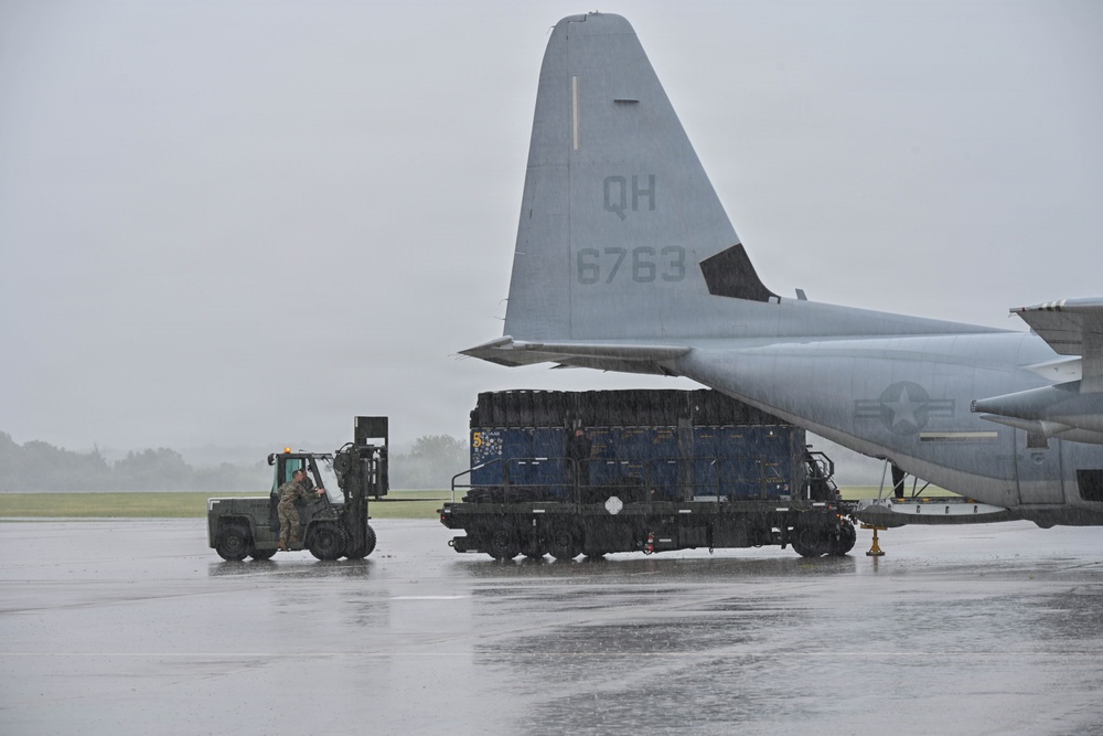 Pennsylvania Air National Guard members unload Blue Angels cargo for the Air Dot Show