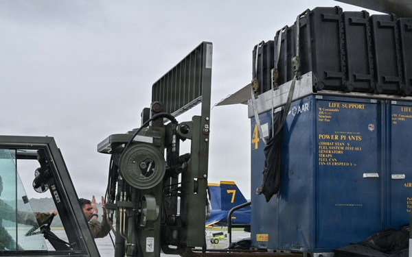 Pennsylvania Air National Guard members unload Blue Angels cargo for Air Dot Show