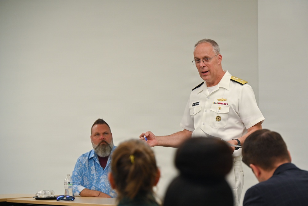 Rear Adm. Eric Ver Hage speaks to audience at Harrisburg University
