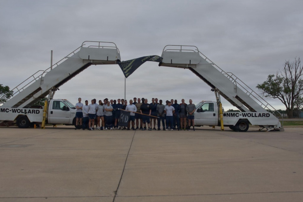 97th LRS Airmen run to honor fallen members of ‘Port Dawg’ community
