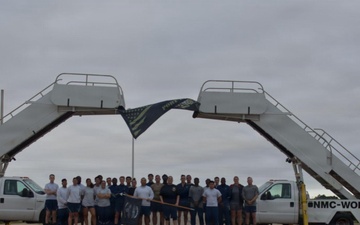 97th LRS Airmen run to honor fallen members of ‘Port Dawg’ community