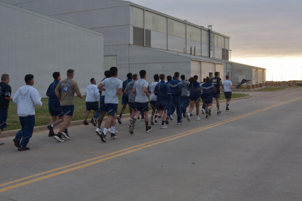 97th LRS Airmen run to honor fallen members of ‘Port Dawg’ community